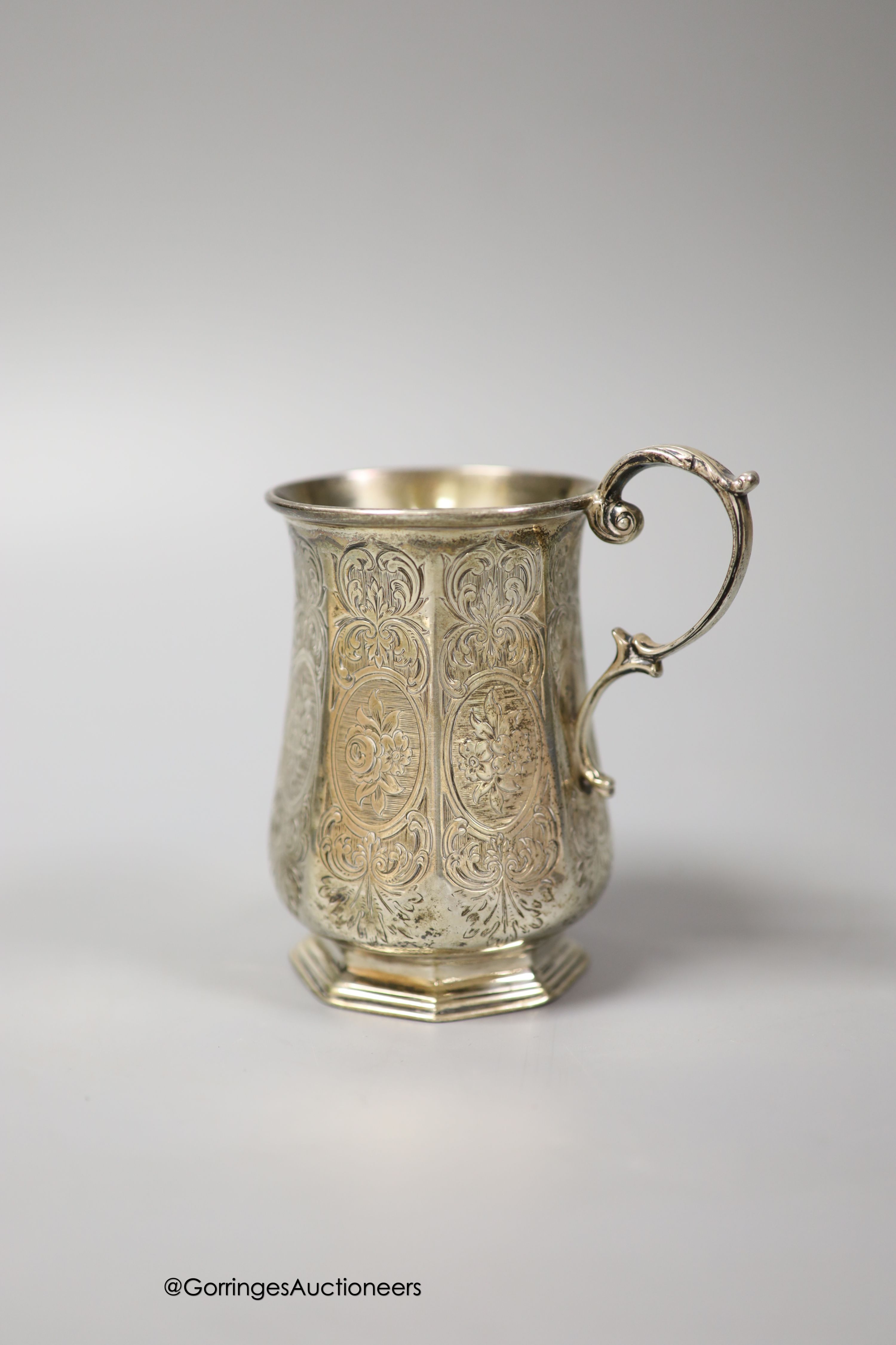 A Victorian engraved silver panelled christening mug, John Evans II, London, 1862, 10.5cm, 152 grams.